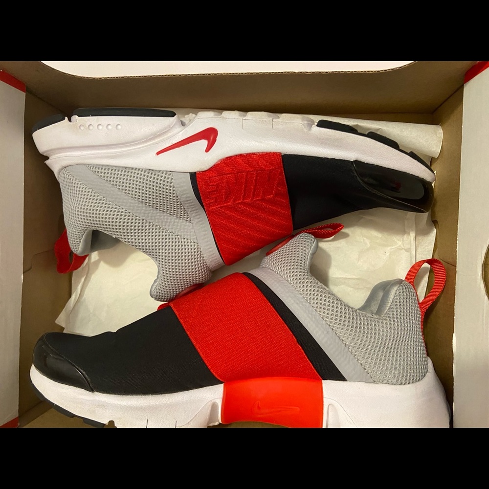 Grey, White Black and Red Nike Sneakers.